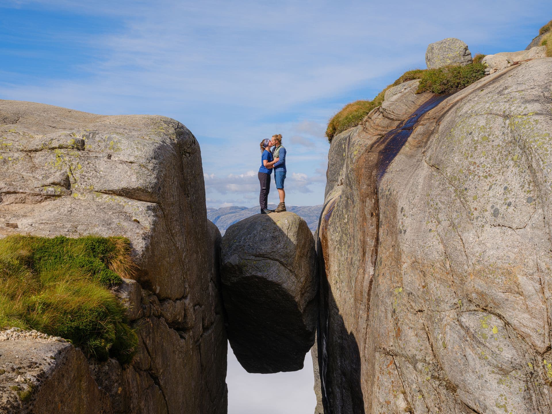 Romantic couple on the Kjeragbolten_