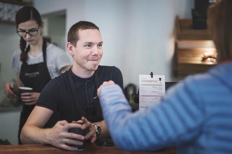 employee in conversation with a customer